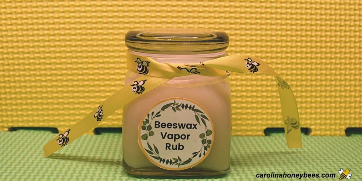 Gift ready jar of diy vapor rub made with beeswax image.