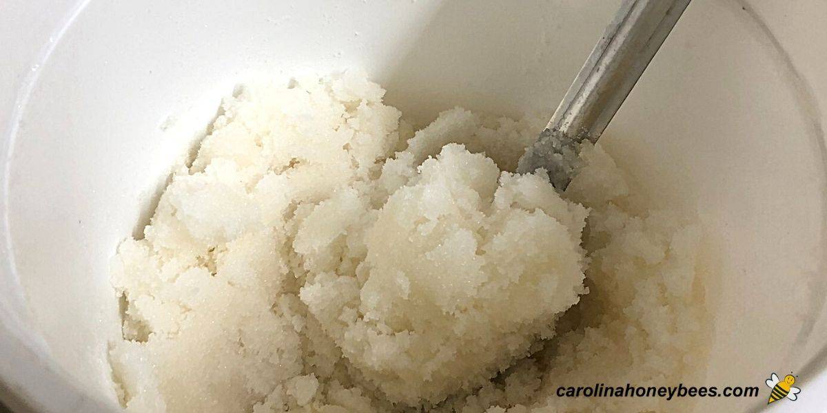 Sugar cake for bees being prepared in bowl.