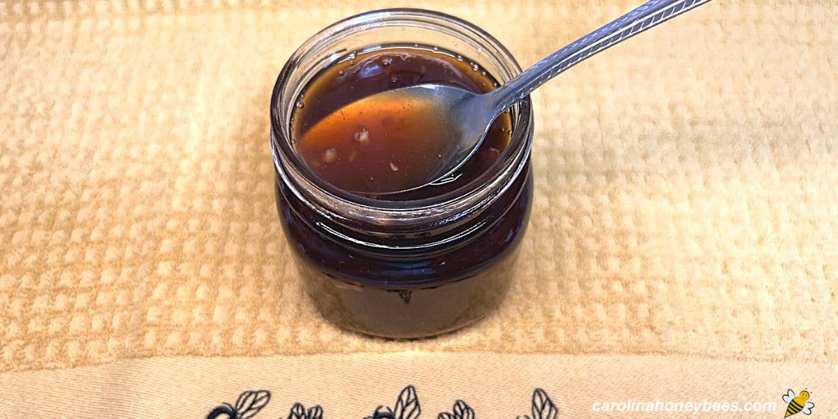 Small glass jar of homemade teriyaki sauce made with honey
