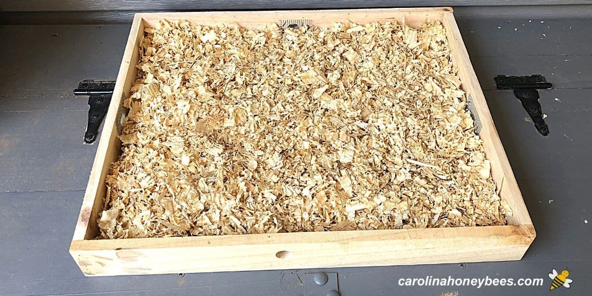 Wooden shim filled with shavings to make a quilt box for a beehive image.