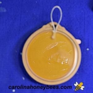 Cord used as a hanger for beeswax ornament image.
