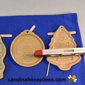 Use tool to level mold image.