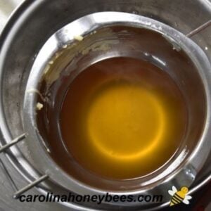Melting wax in pot image.