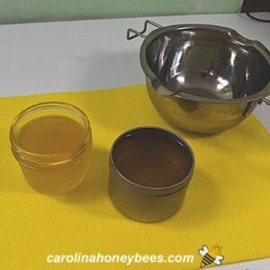 Pouring salve recipe into suitable containers image.