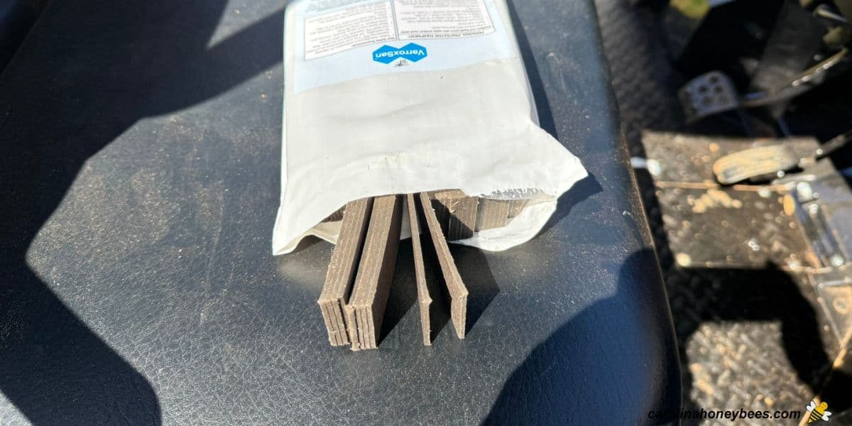 Package of Varroxsan oxalic acid strips labeled for mite treatments.