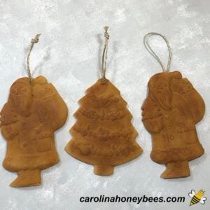 Various beeswax christmas ornaments blackened image.